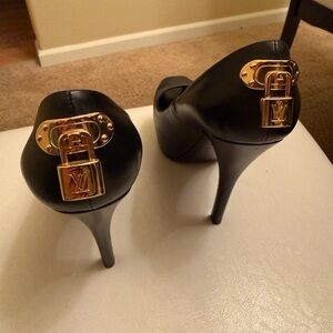 Louis Vuitton Elegant Black Heels with Gold Accent